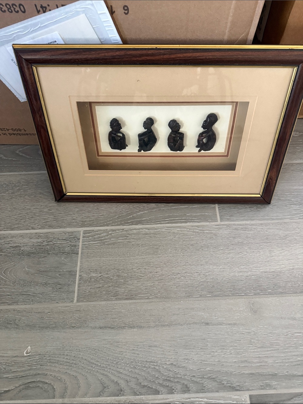 Framed Four Silhouette Sculptures Wall Art - Brown Frame, Black Figures